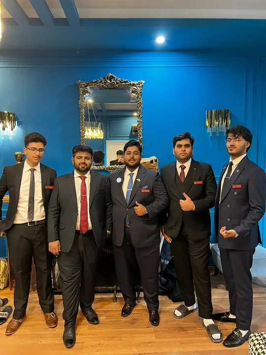 ELARA MUN I team members in formal suits